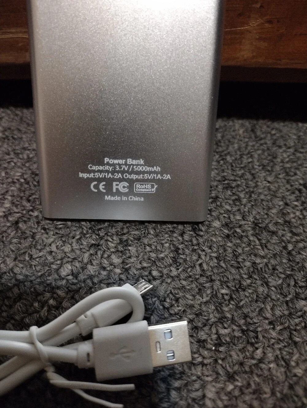 Silver Portable Power Bank with White USB Cable
